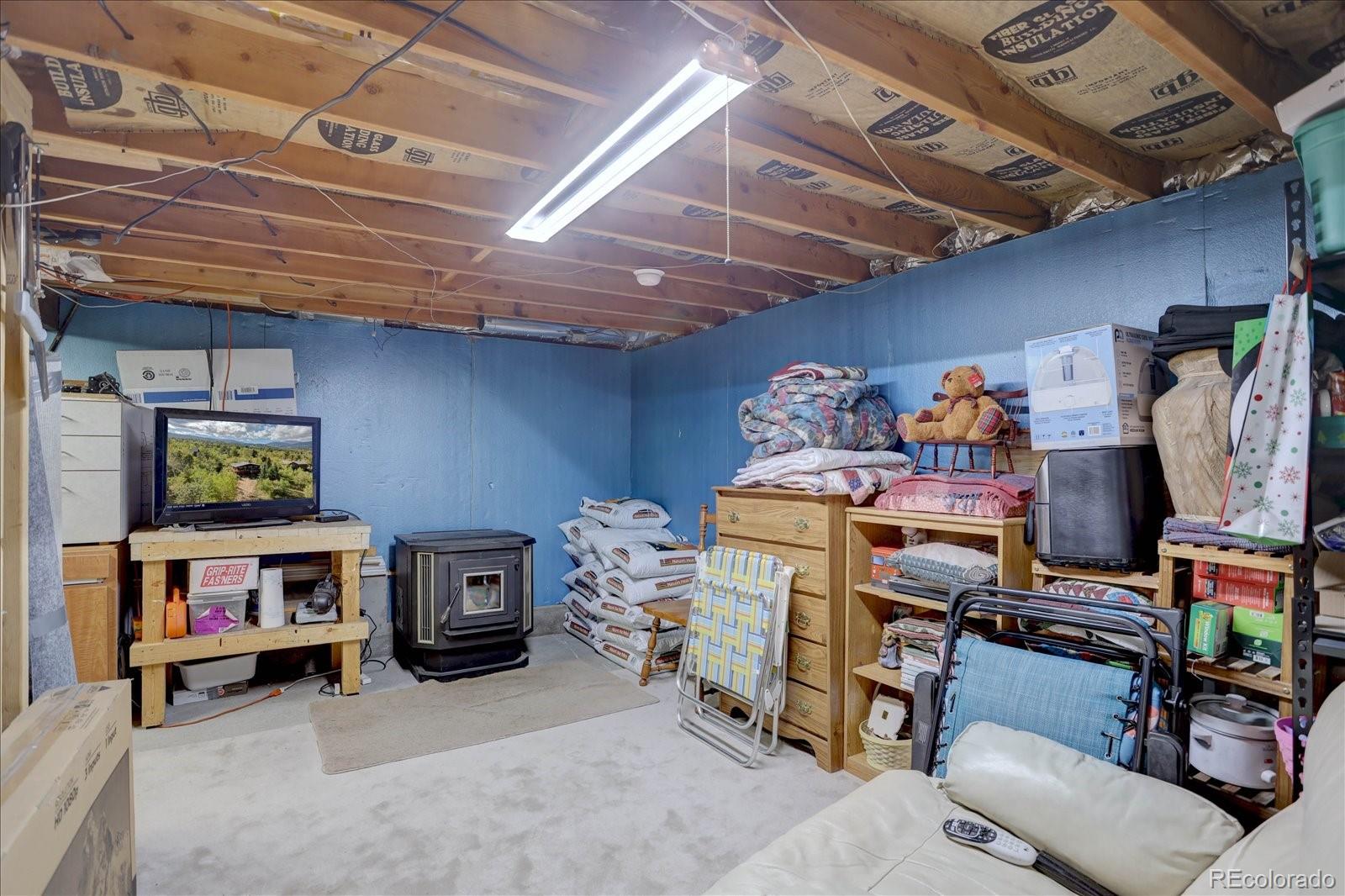 255 Saddlestring Road Bailey, CO 80421 - Photo 25 of 49 a view of a storage & utility room with stuff