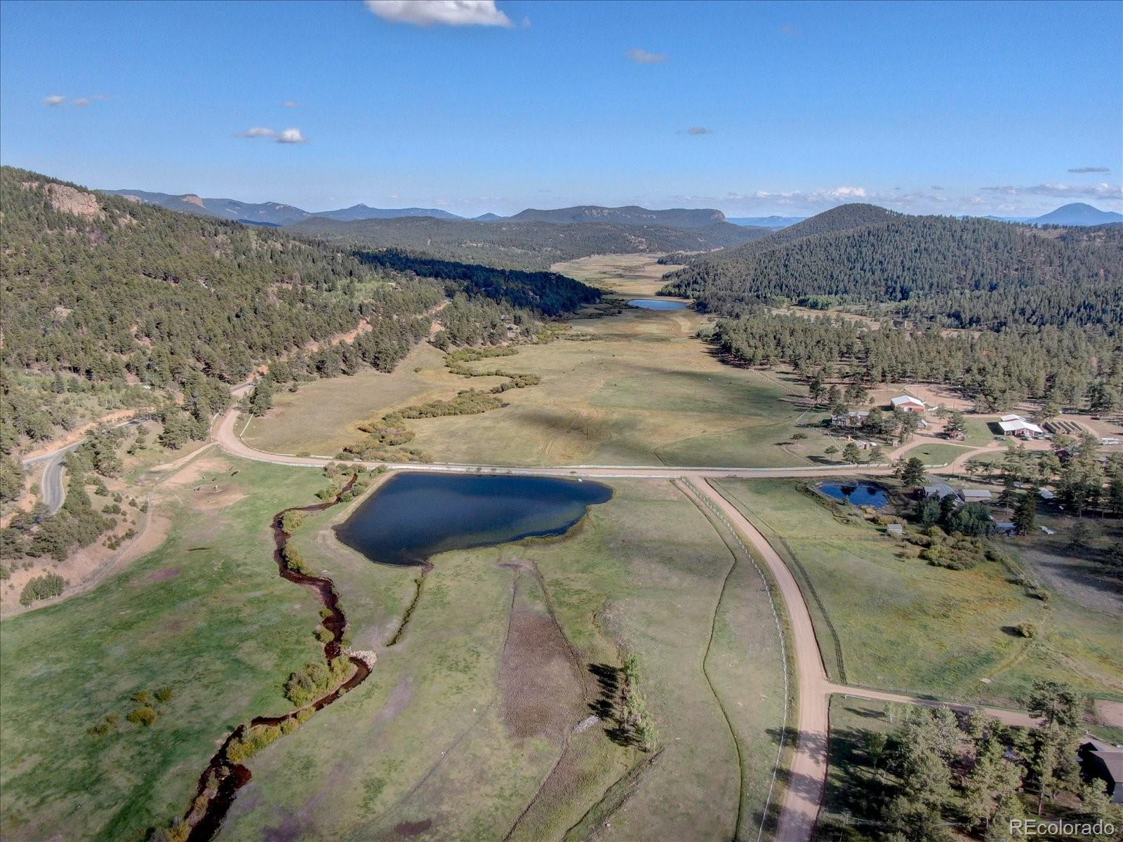 255 Saddlestring Road Bailey, CO 80421 - Photo 41 of 49 a view of a sky from a yard