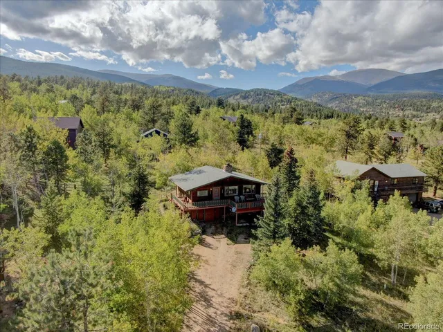 a view of a bunch of trees and houses