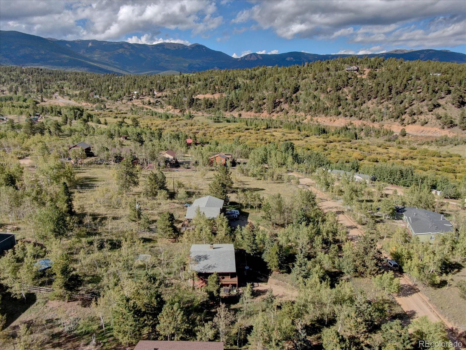 255 Saddlestring Road Bailey, CO 80421 - Photo 48 of 49 a view of a yard with wooden fence