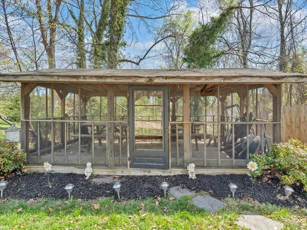 a view of a porch with a yard