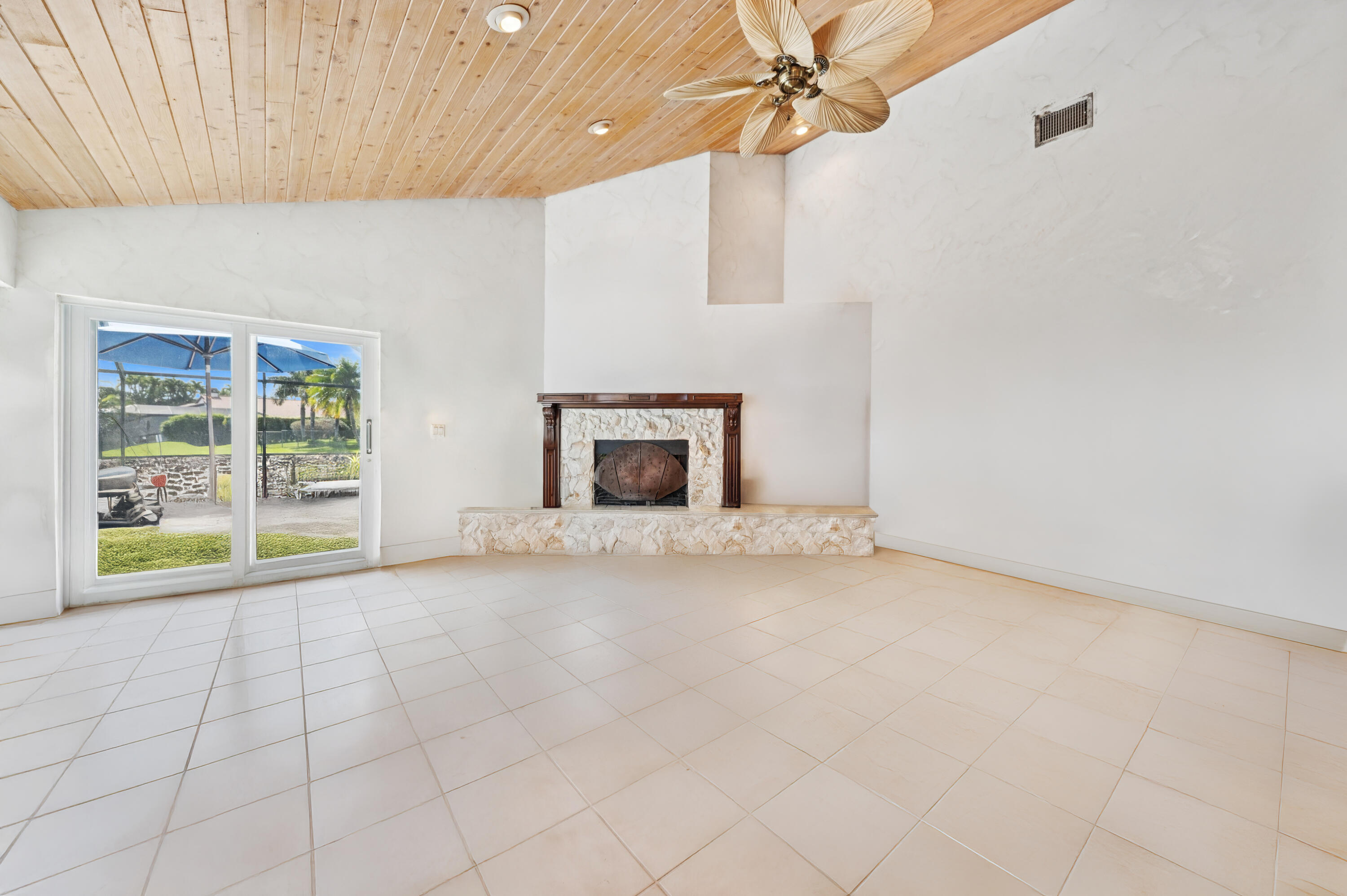 7018 Northwest 3rd Avenue Boca Raton, FL 33487 - Photo 12 of 36 05_7018-NW-3rd-Ave_Living-Room_Print 2