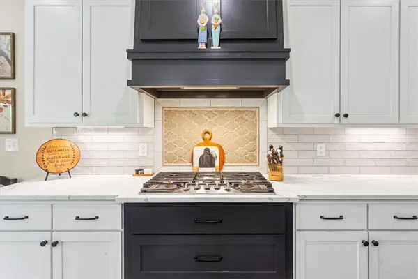 a bedroom with a bed and a potted plant