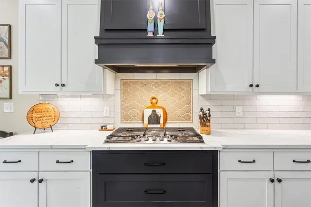 a bedroom with a bed and a potted plant