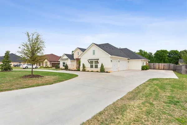 a view of house with outdoor space and street view
