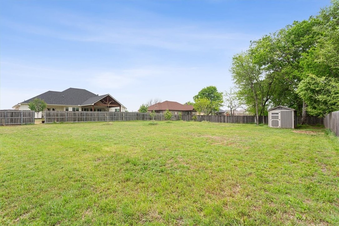 8 Independence Trail Waco, TX 76708 - Photo 38 of 39 a view of a house with a yard and a large tree