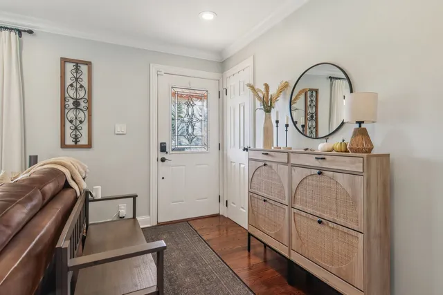 a view of a livingroom with furniture and furniture