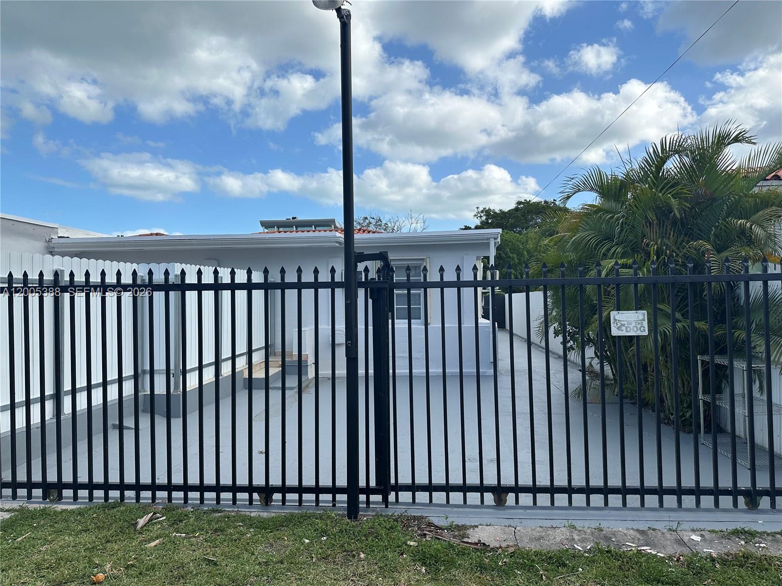 1765 Southwest 21st Street, Unit 3 Miami, FL 33145 - Photo 3 of 15 a balcony with a yard