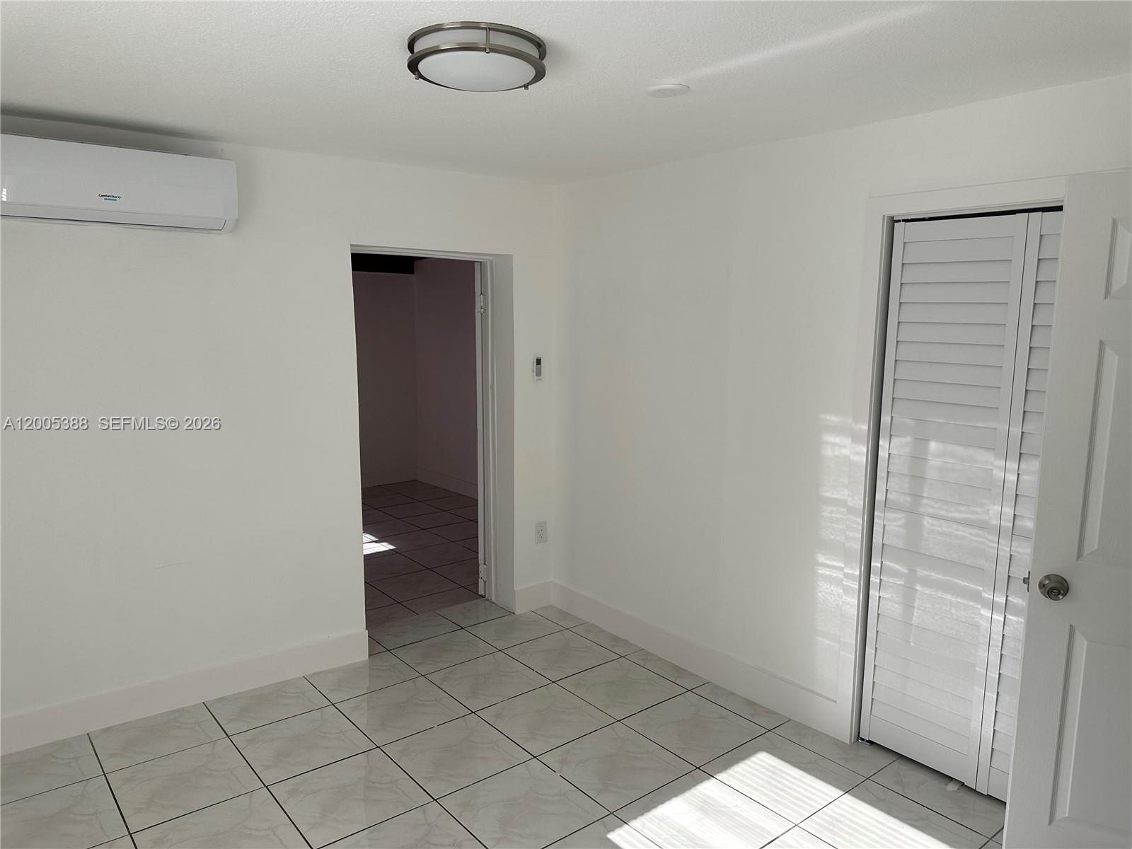 1765 Southwest 21st Street, Unit 3 Miami, FL 33145 - Photo 6 of 15 a view of an empty room