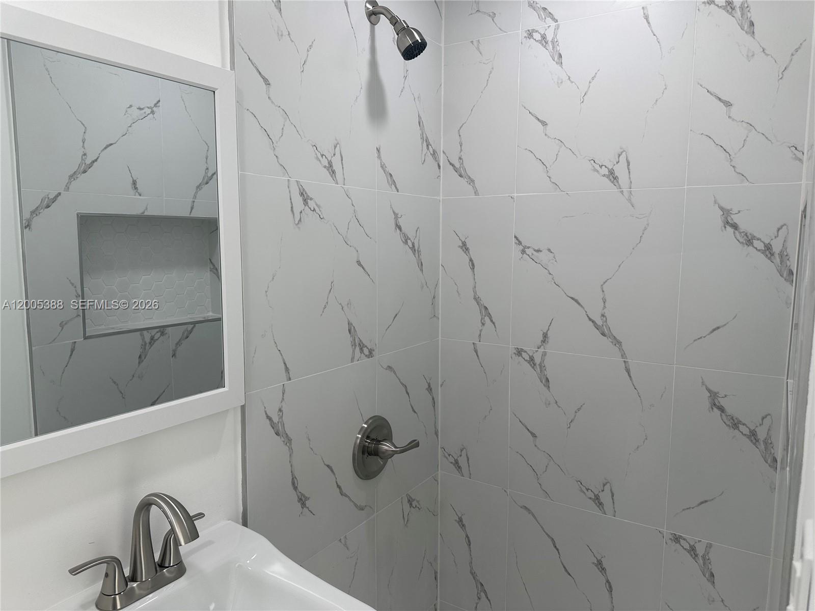 1765 Southwest 21st Street, Unit 3 Miami, FL 33145 - Photo 8 of 15 a bathroom with a shower