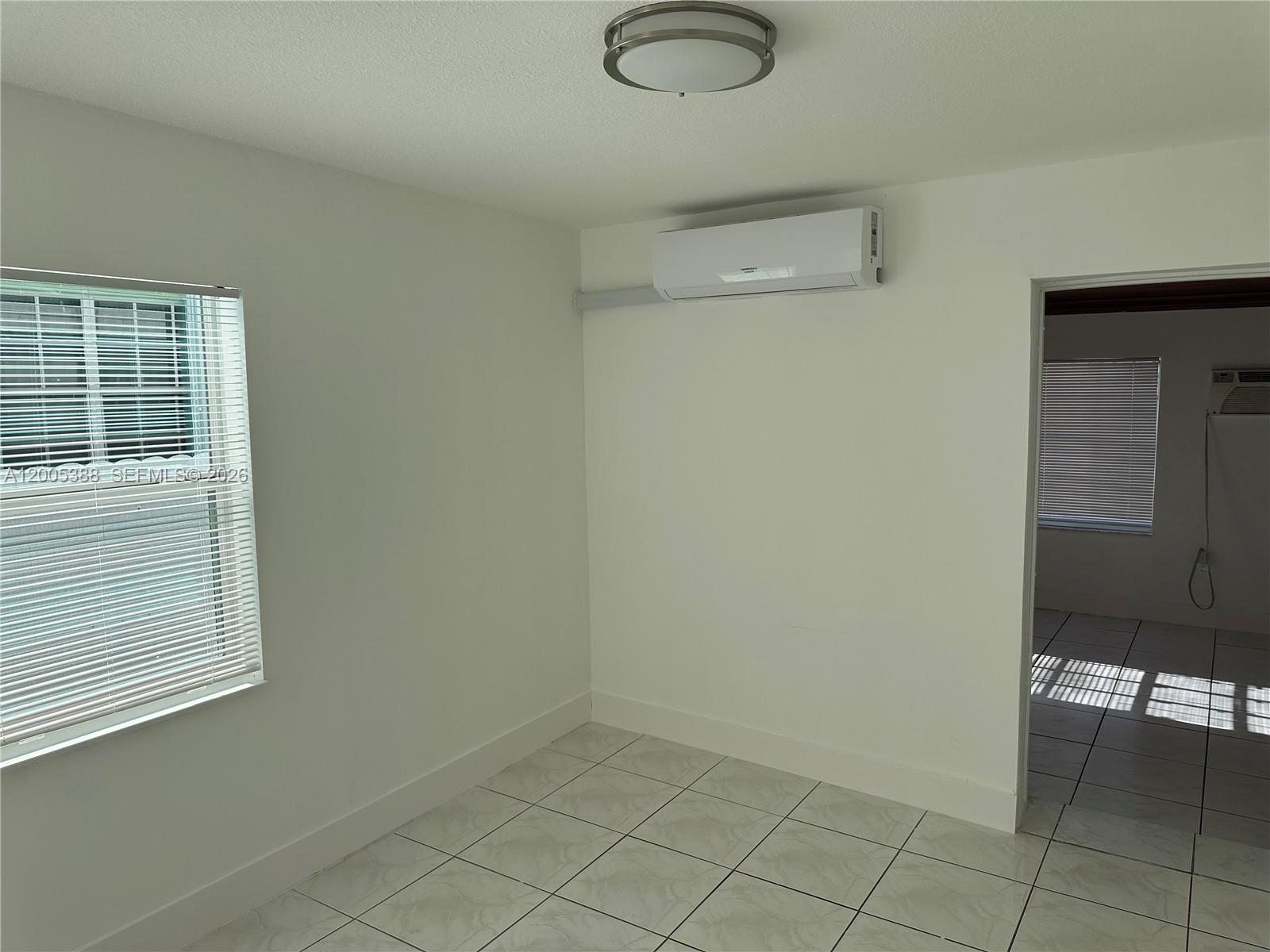 1765 Southwest 21st Street, Unit 3 Miami, FL 33145 - Photo 10 of 15 a view of an empty room