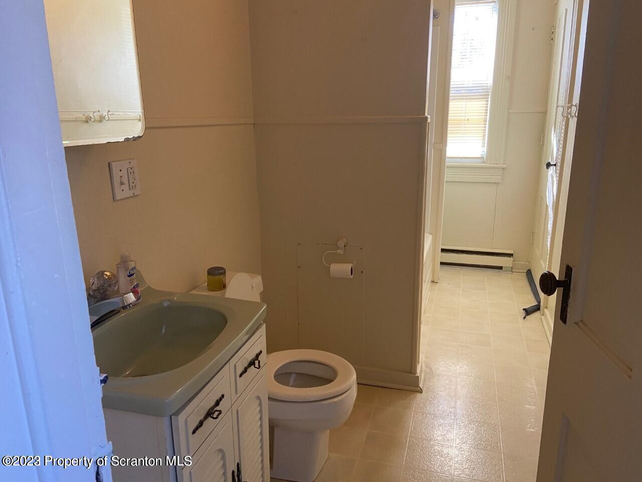 Undisclosed Address Clarks Summit, PA 18411 - Photo 5 of 8 a bathroom with a sink toilet and shower
