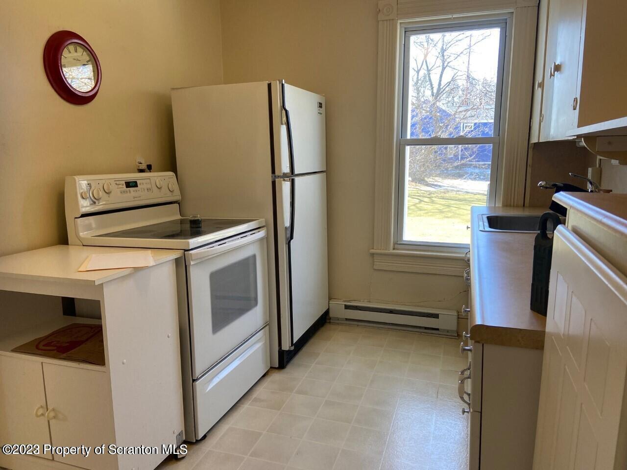 Undisclosed Address Clarks Summit, PA 18411 - Photo 6 of 8 a utility room with dryer and washer