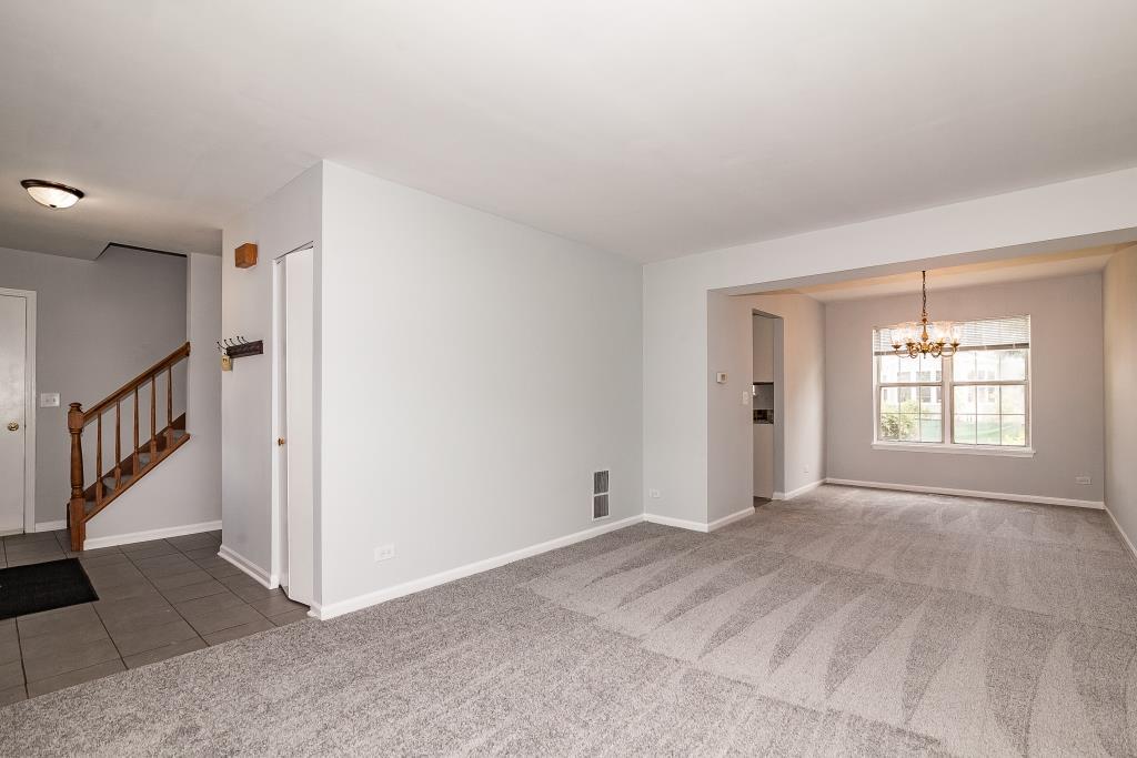 109 South Southport Road Mundelein, IL 60060 - Photo 7 of 16 a view of an empty room with a window