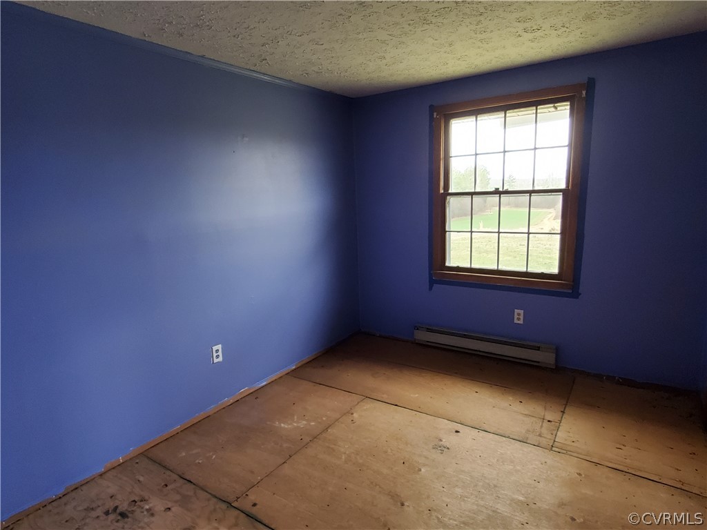 1600 Namozine Road Church Road, VA 23833 - Photo 14 of 45 an empty room with a window