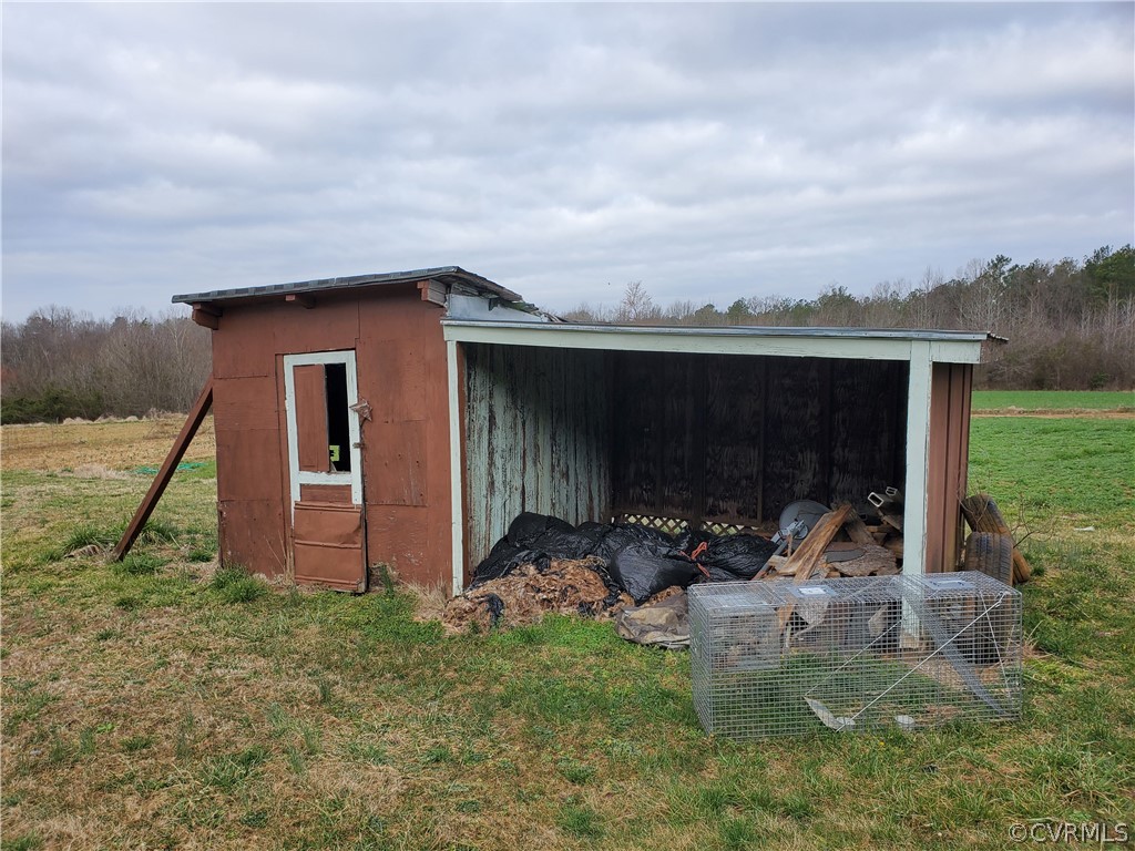 1600 Namozine Road Church Road, VA 23833 - Photo 19 of 45 a view of backyard with barbeque grill and potted plants