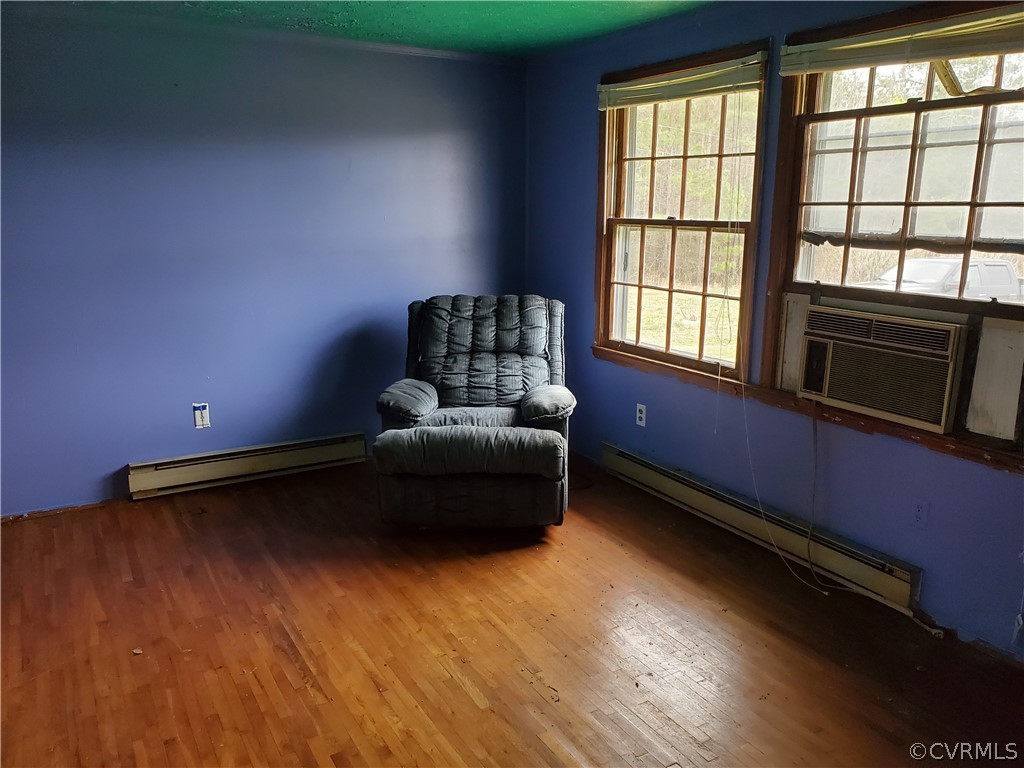 1600 Namozine Road Church Road, VA 23833 - Photo 9 of 45 a living room with furniture and a floor to ceiling window