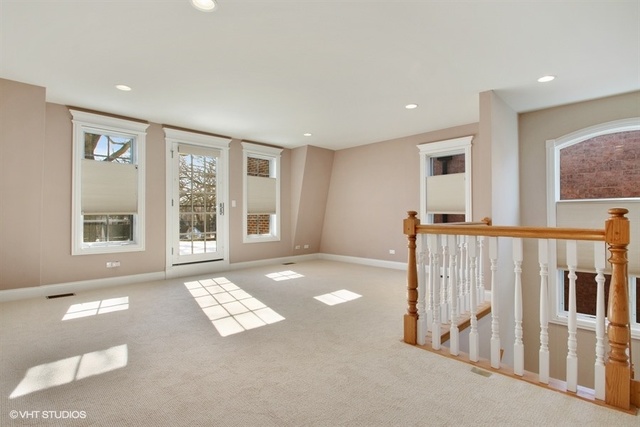 2117 Harrison Street Evanston, IL 60201 - Photo 18 of 26 a view of an empty room with a window