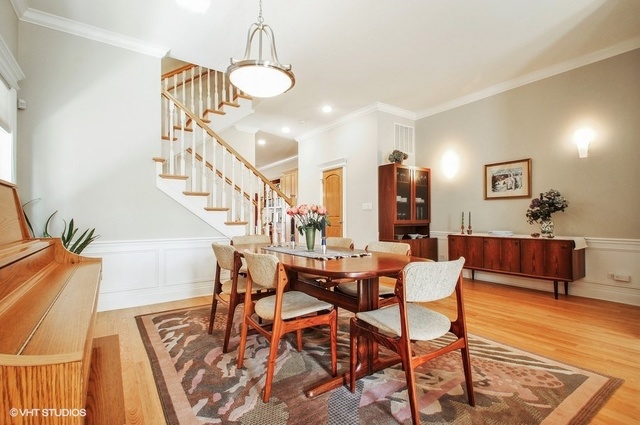 2117 Harrison Street Evanston, IL 60201 - Photo 4 of 26 a view of a livingroom and dining room