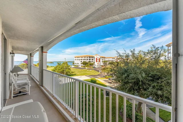 a building view with palm trees