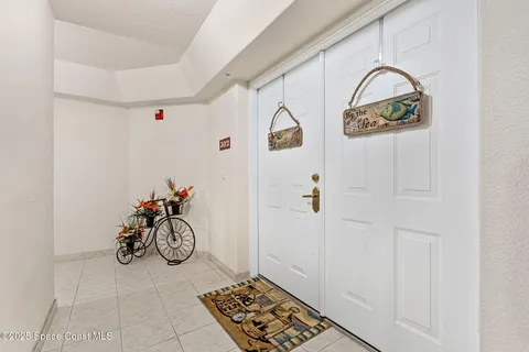 a kitchen with a sink stainless steel appliances and cabinets