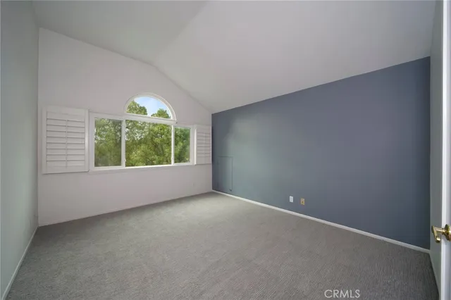 a bathroom with a double vanity sink mirror and shower