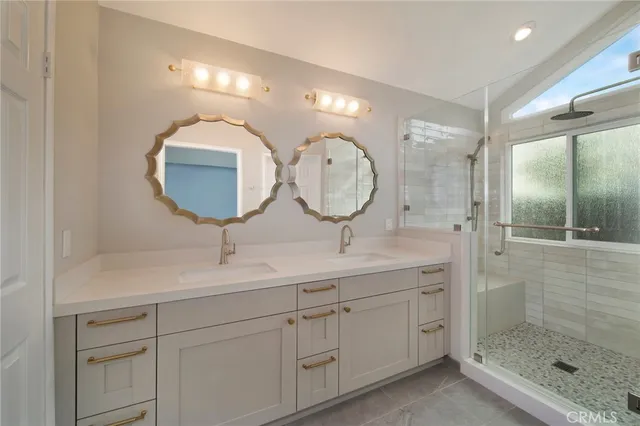 a bathroom with a bathtub and a shower