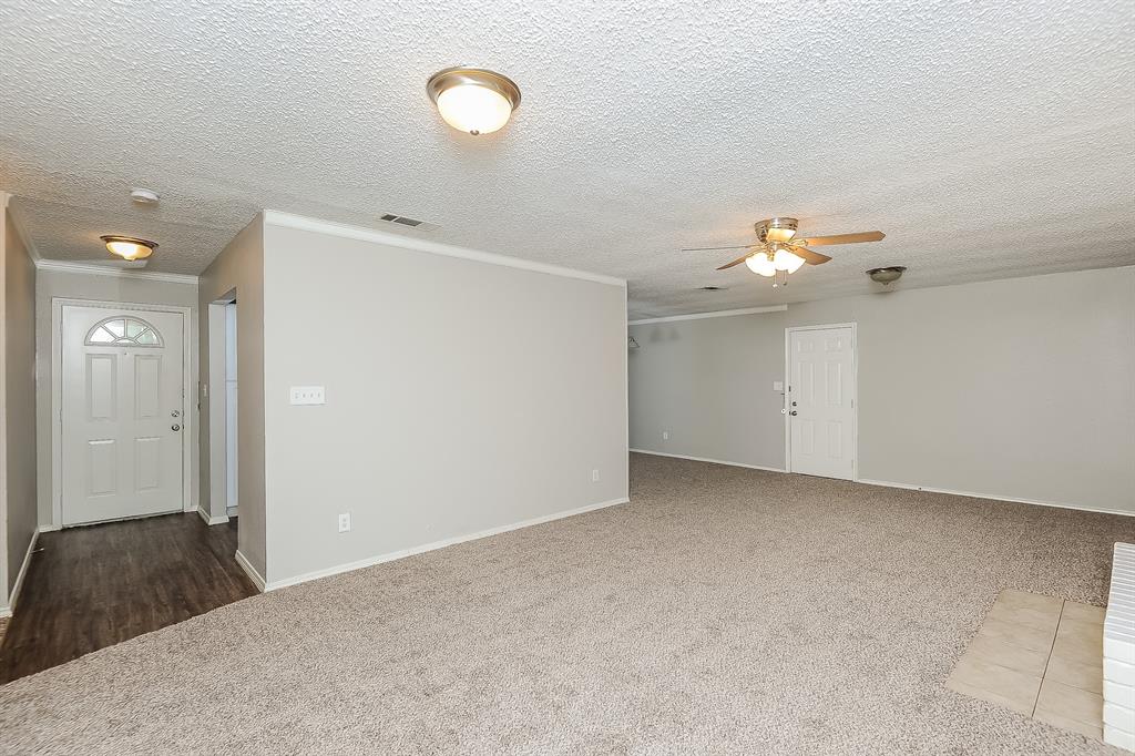 3001 Rufe Snow Drive Richland Hills, TX 76118 - Photo 3 of 15 a view of a livingroom with an empty space