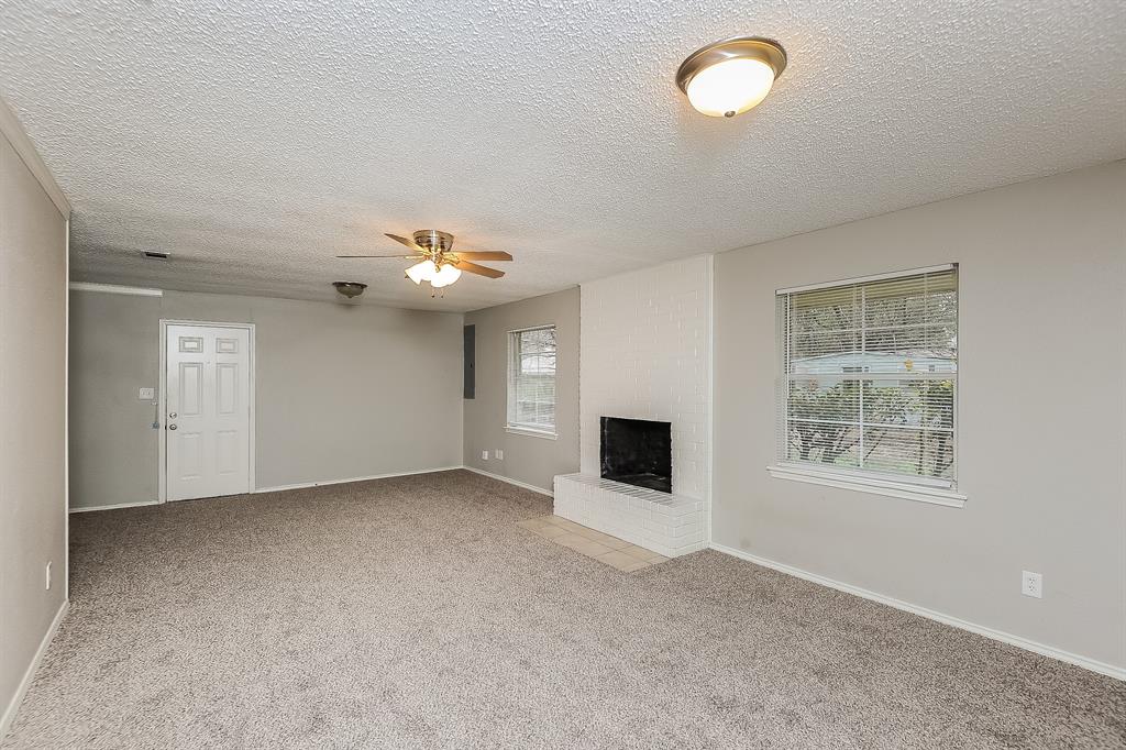 3001 Rufe Snow Drive Richland Hills, TX 76118 - Photo 4 of 15 a view of an empty room with a window