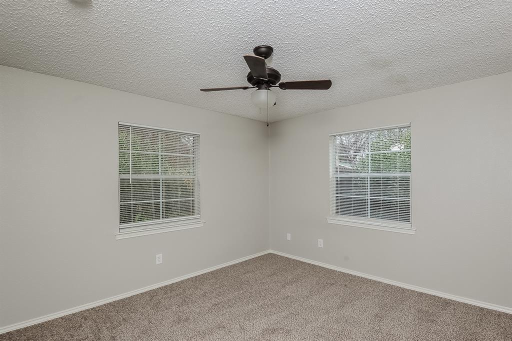 3001 Rufe Snow Drive Richland Hills, TX 76118 - Photo 9 of 15 a view of an empty room with a window
