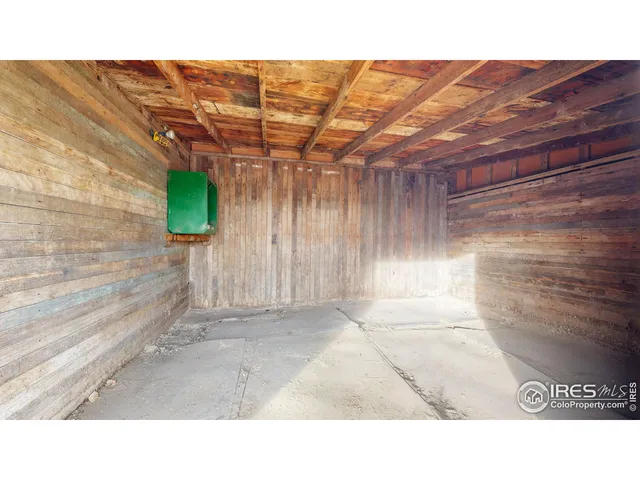 a open area with a bench and trees