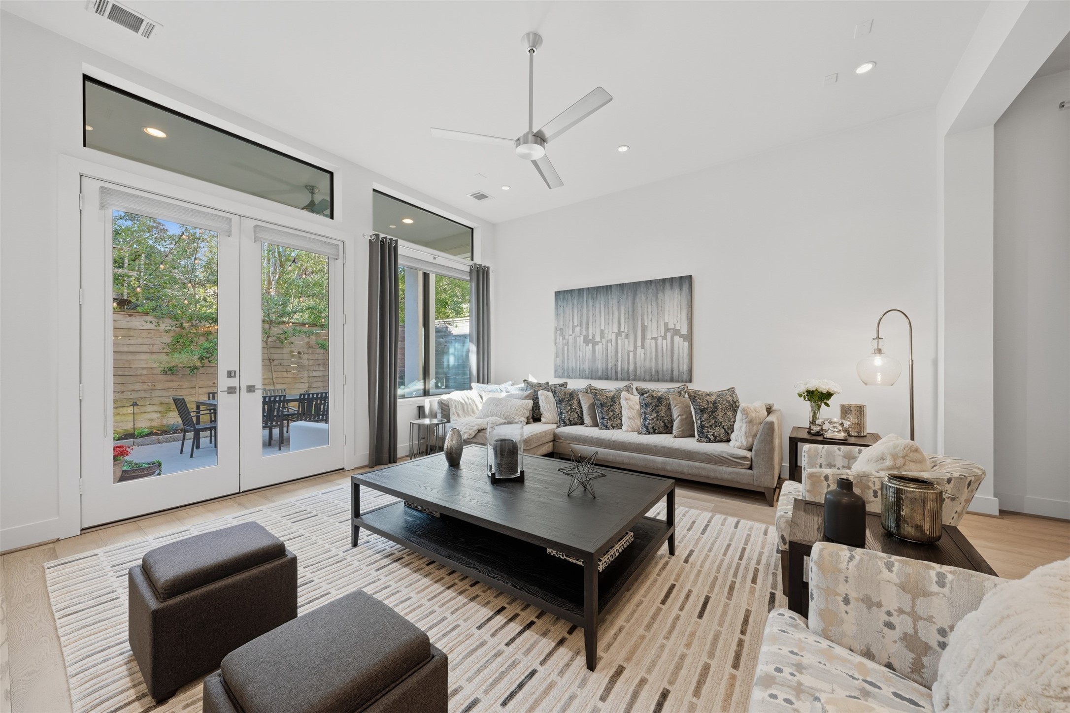 2114 McDuffie Street Houston, TX 77019 - Photo 17 of 45 The living room is bathed in natural light with wall space for showcasing your art collection.
