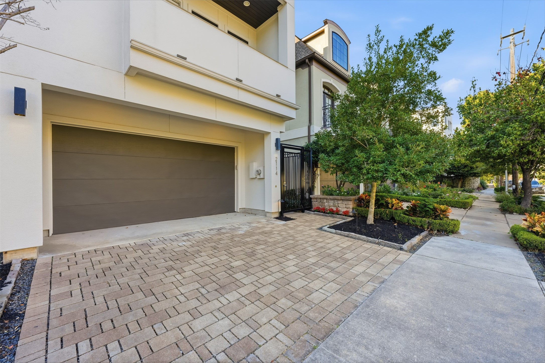 2114 McDuffie Street Houston, TX 77019 - Photo 2 of 45 The 2-car garage and private gated entry provide convenience and security.