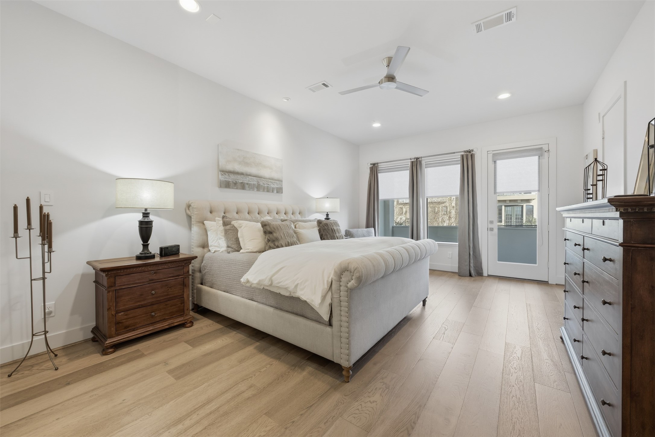 2114 McDuffie Street Houston, TX 77019 - Photo 24 of 45 The primary suite, located on the second floor, is an oasis with a generously sized bedroom and balcony.