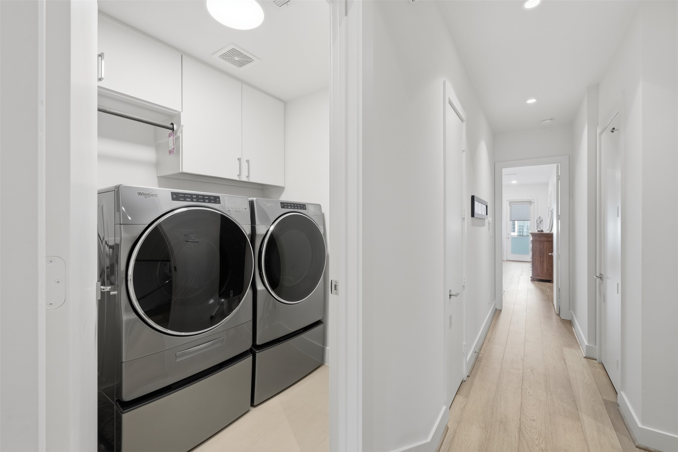 2114 McDuffie Street Houston, TX 77019 - Photo 36 of 45 The laundry room is located in the hallway on the second floor. (washer and dryer convey with home)