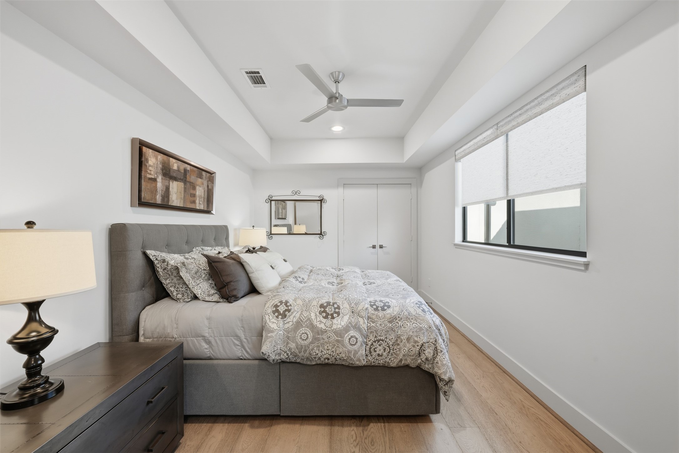 2114 McDuffie Street Houston, TX 77019 - Photo 39 of 45 This 3rd floor bedroom is tucked away with a double door entry.