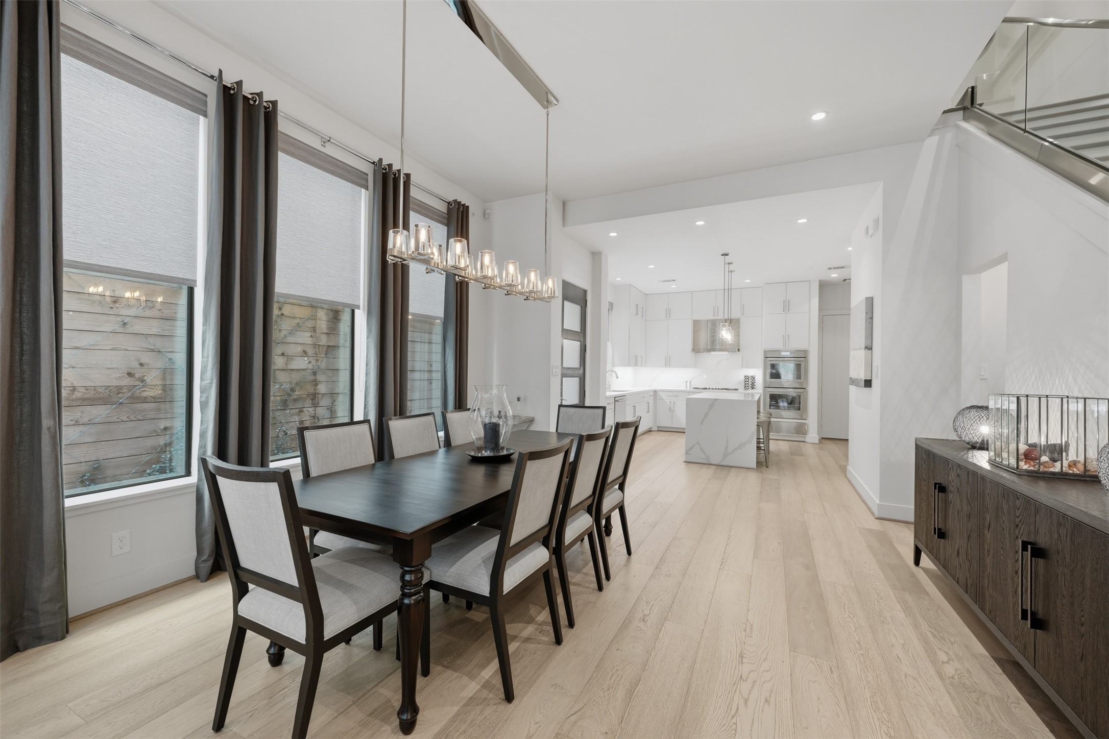 2114 McDuffie Street Houston, TX 77019 - Photo 10 of 45 The chandelier over the dining table and pendants over the island are Restoration Hardware.