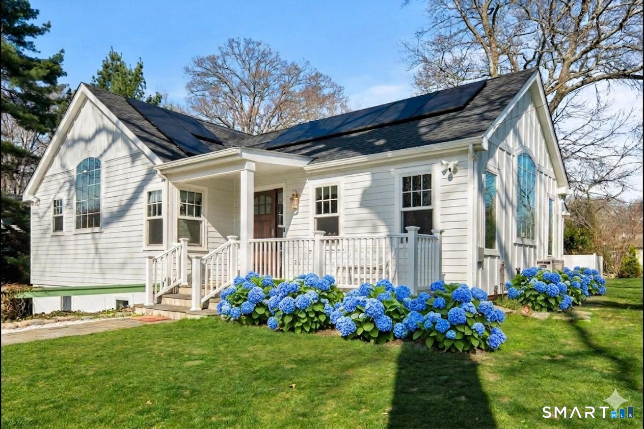 Front of home with digitally enhanced hydrangea blooms