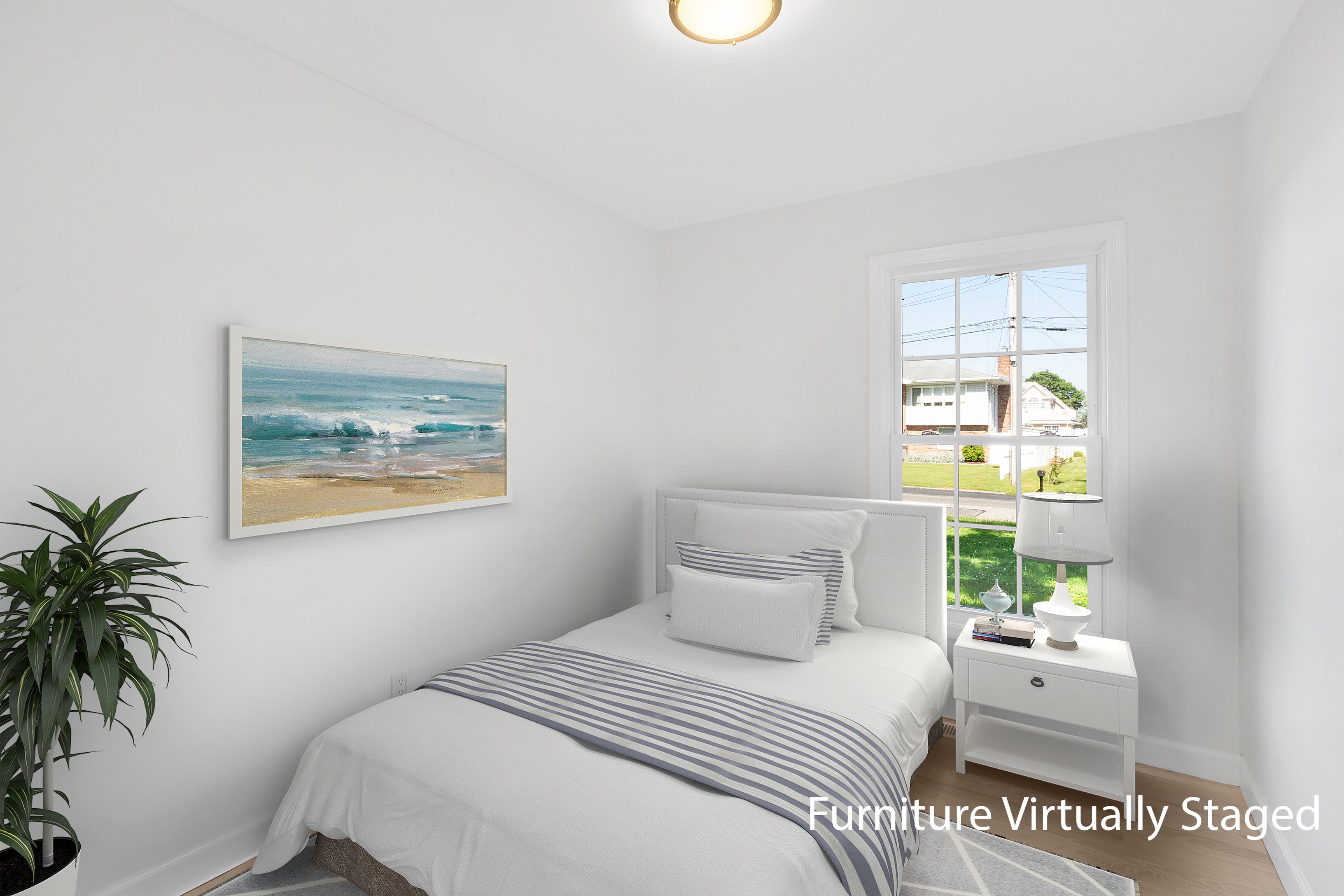 6 Whiting Road East Quogue, NY 11942 - Photo 11 of 18 a bedroom with a bed and a window