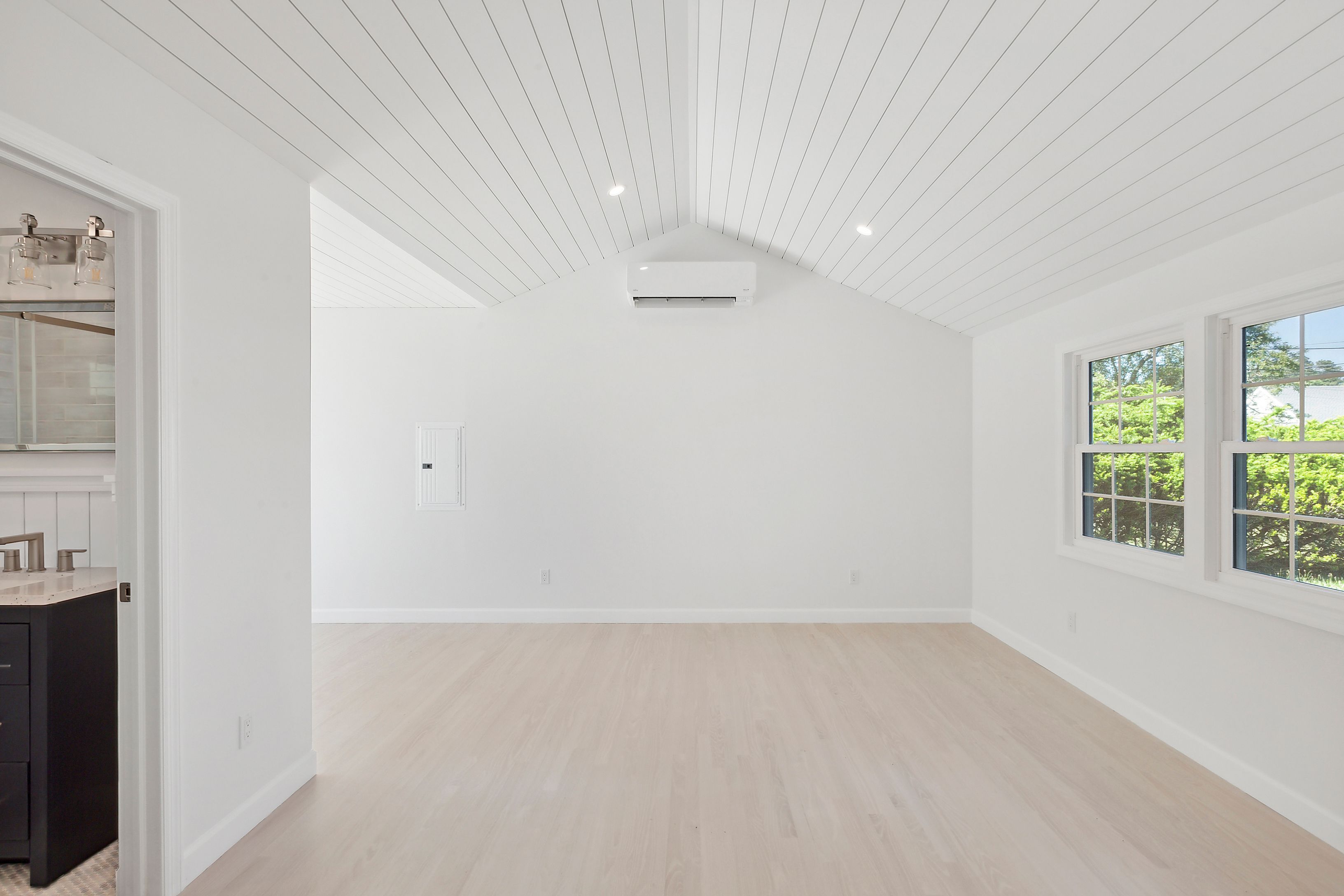 6 Whiting Road East Quogue, NY 11942 - Photo 14 of 18 an empty room with windows