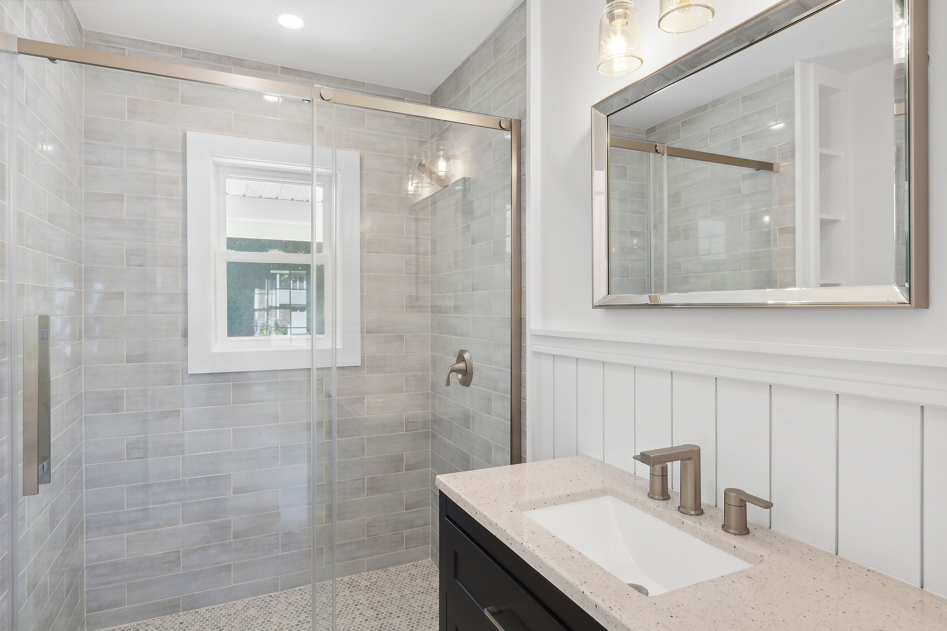 6 Whiting Road East Quogue, NY 11942 - Photo 16 of 18 a bathroom with a sink and a mirror