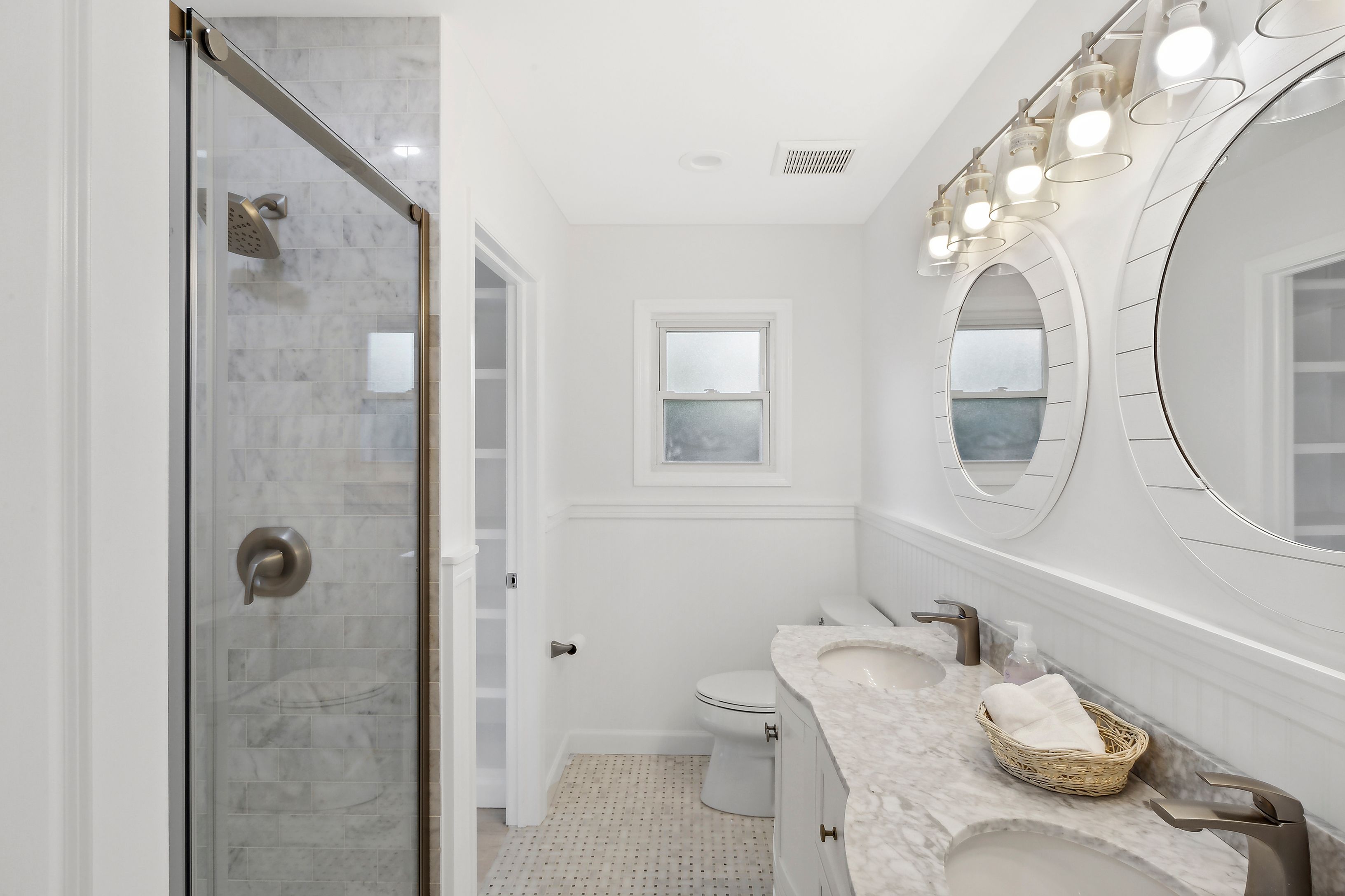 6 Whiting Road East Quogue, NY 11942 - Photo 7 of 18 a bathroom with a granite countertop sink a toilet and shower