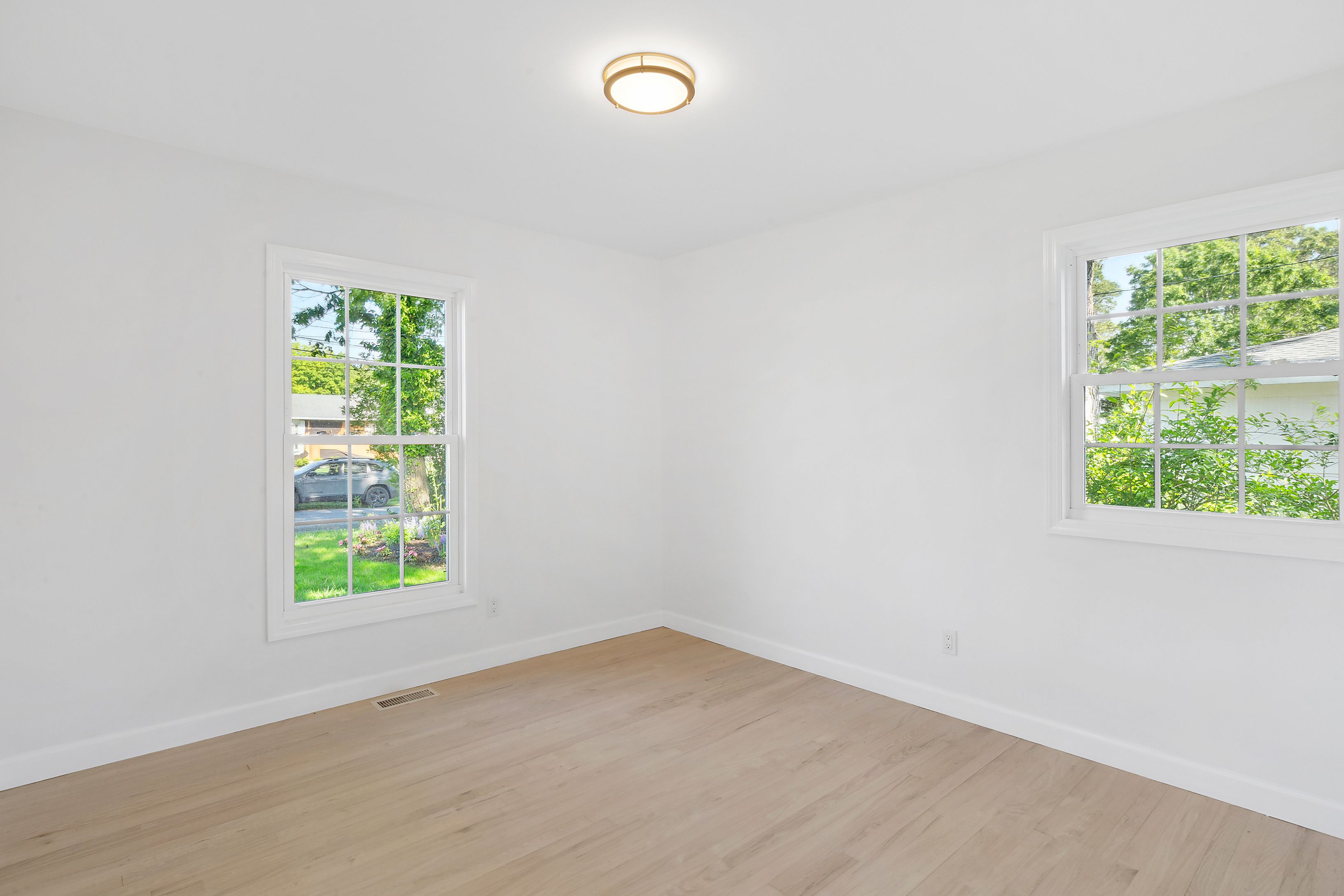 6 Whiting Road East Quogue, NY 11942 - Photo 8 of 18 an empty room with windows