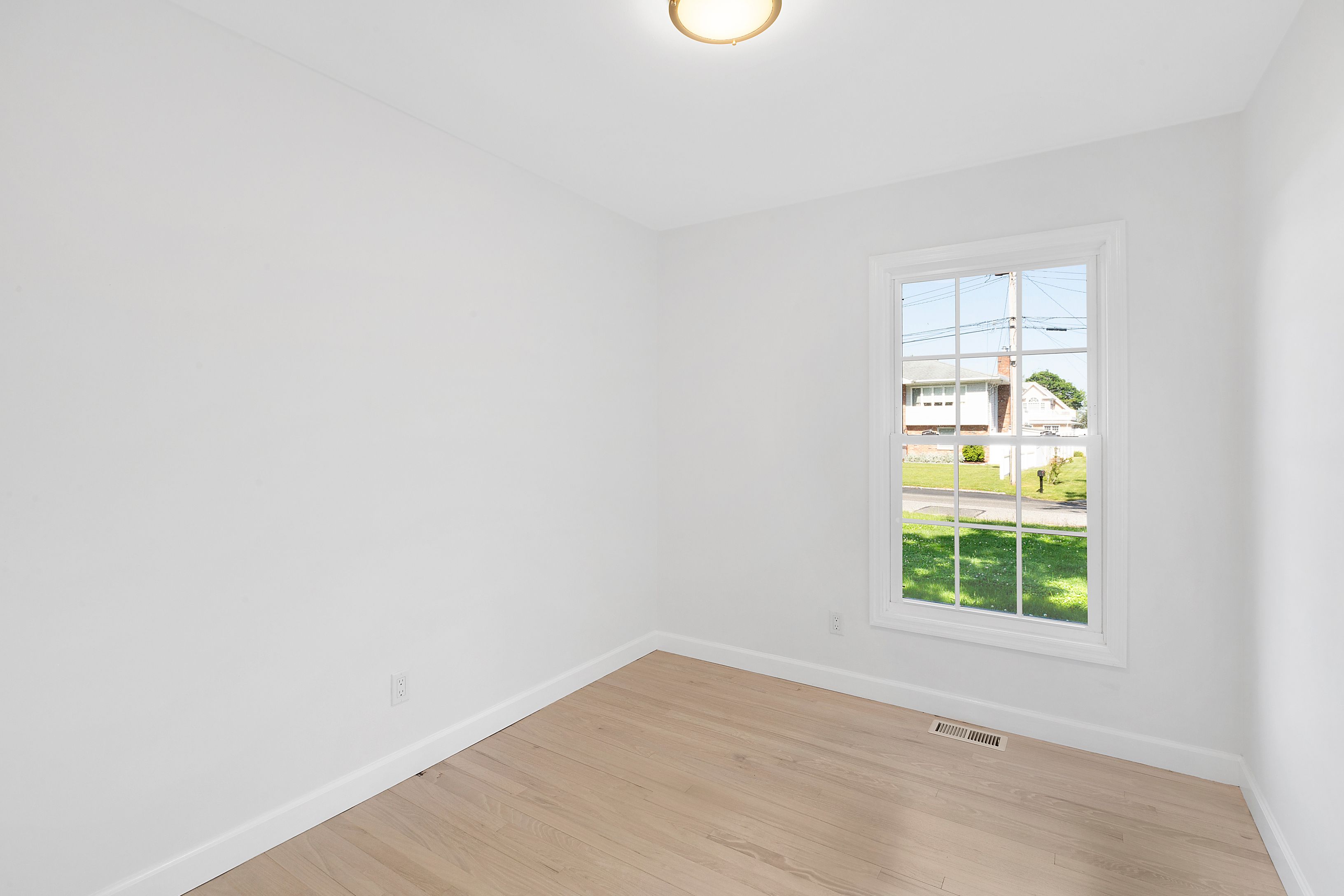 6 Whiting Road East Quogue, NY 11942 - Photo 10 of 18 a view of a small space with a window