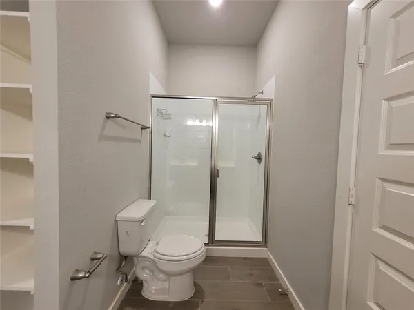 a house with trees in the background