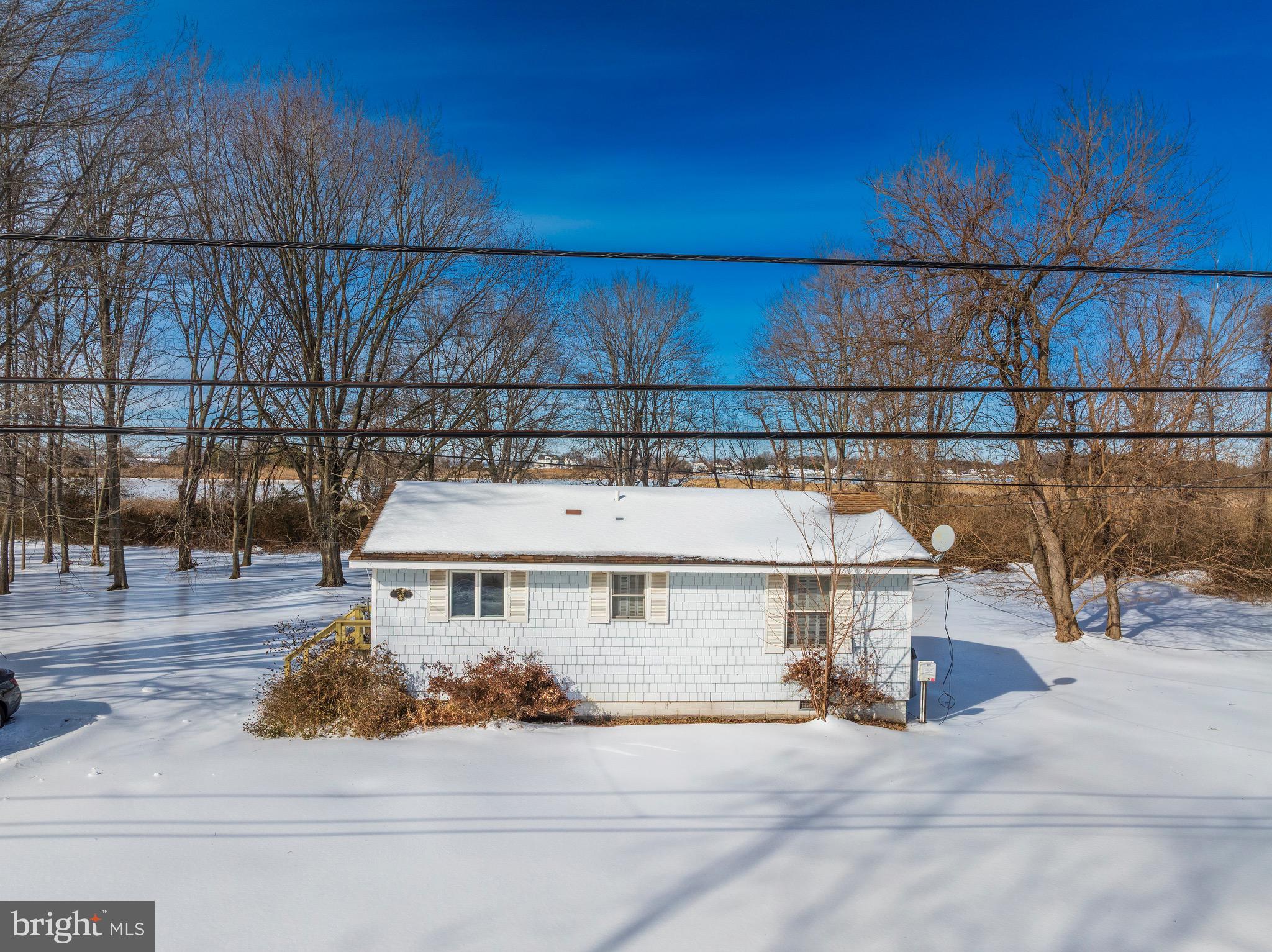 346 Oregon Road Stevensville, MD 21666 - Photo 2 of 10 a view of house and outdoor space