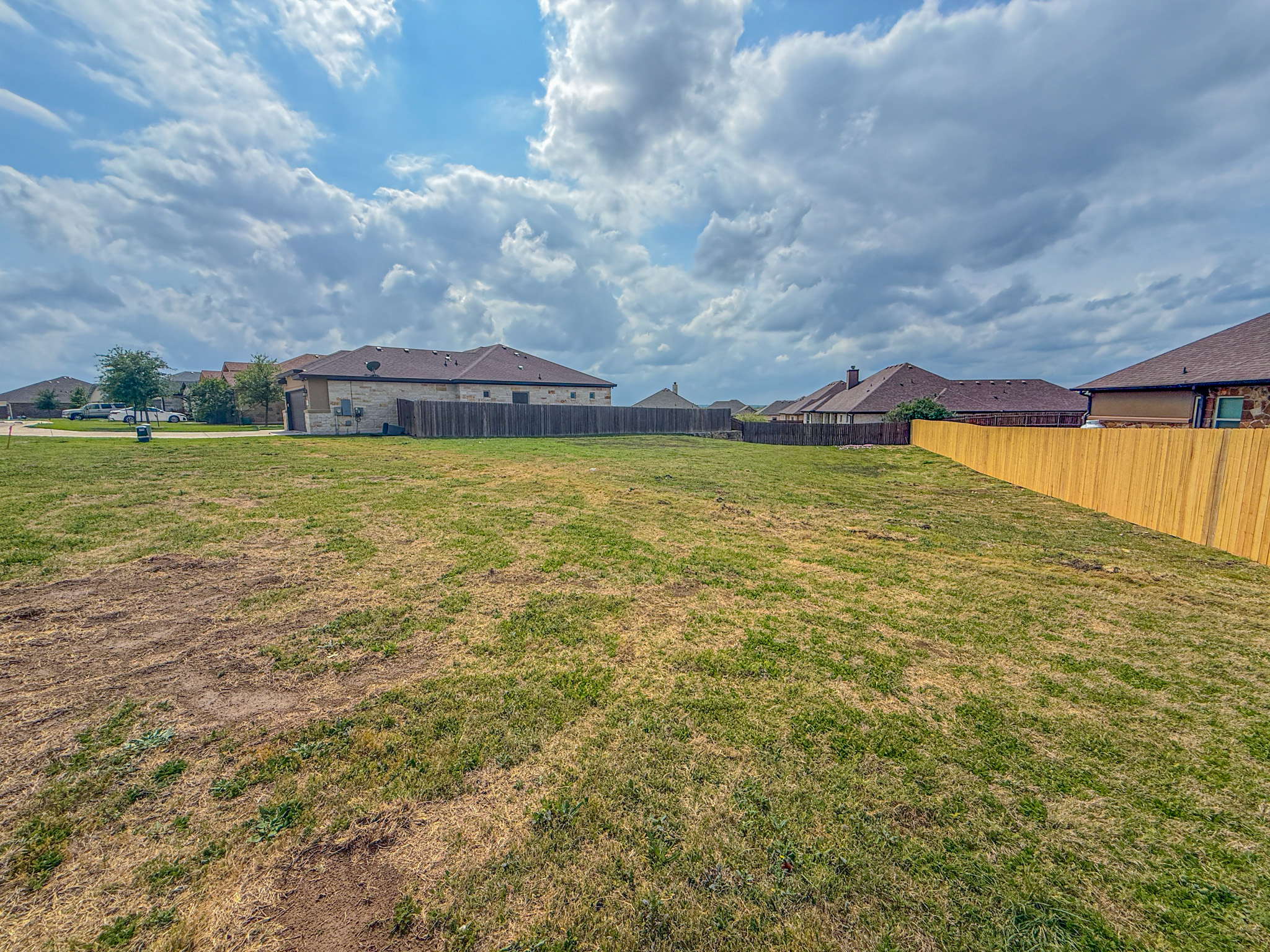 169 Greg Lane Jarrell, TX 76537 - Photo 2 of 5 Fenced yard with a residential view