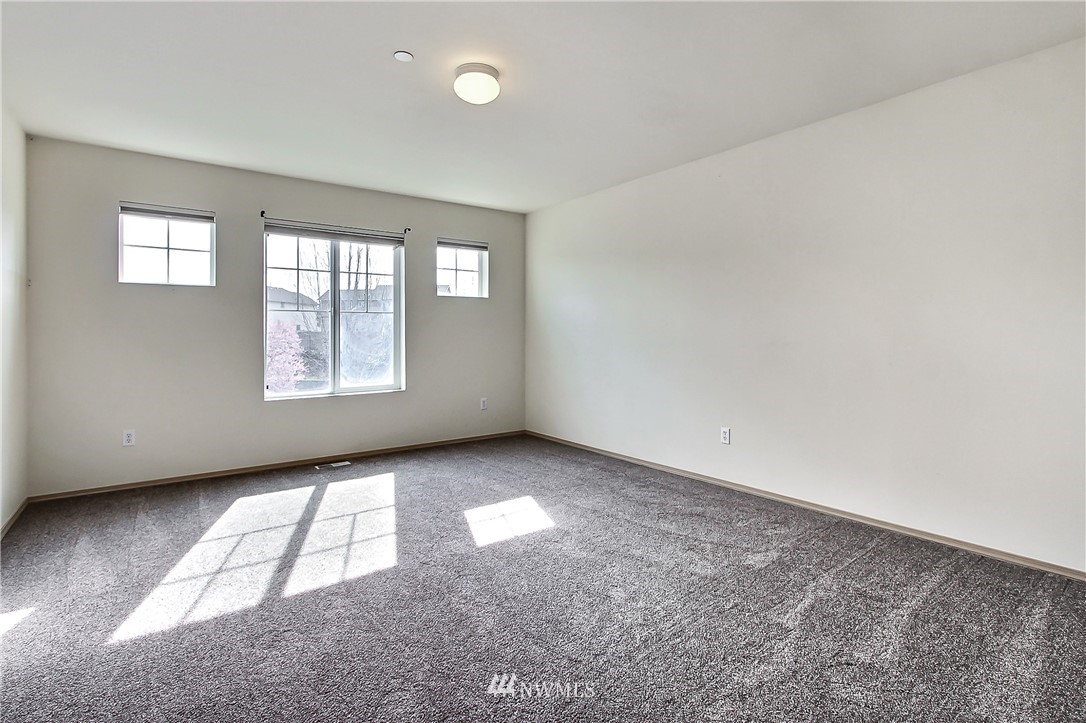 3141 Walker Road DuPont, WA 98327 - Photo 14 of 18 an empty room with windows