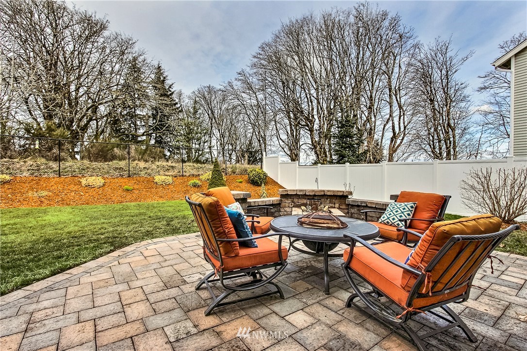 3141 Walker Road DuPont, WA 98327 - Photo 3 of 18 an outdoor sitting area with furniture and garden