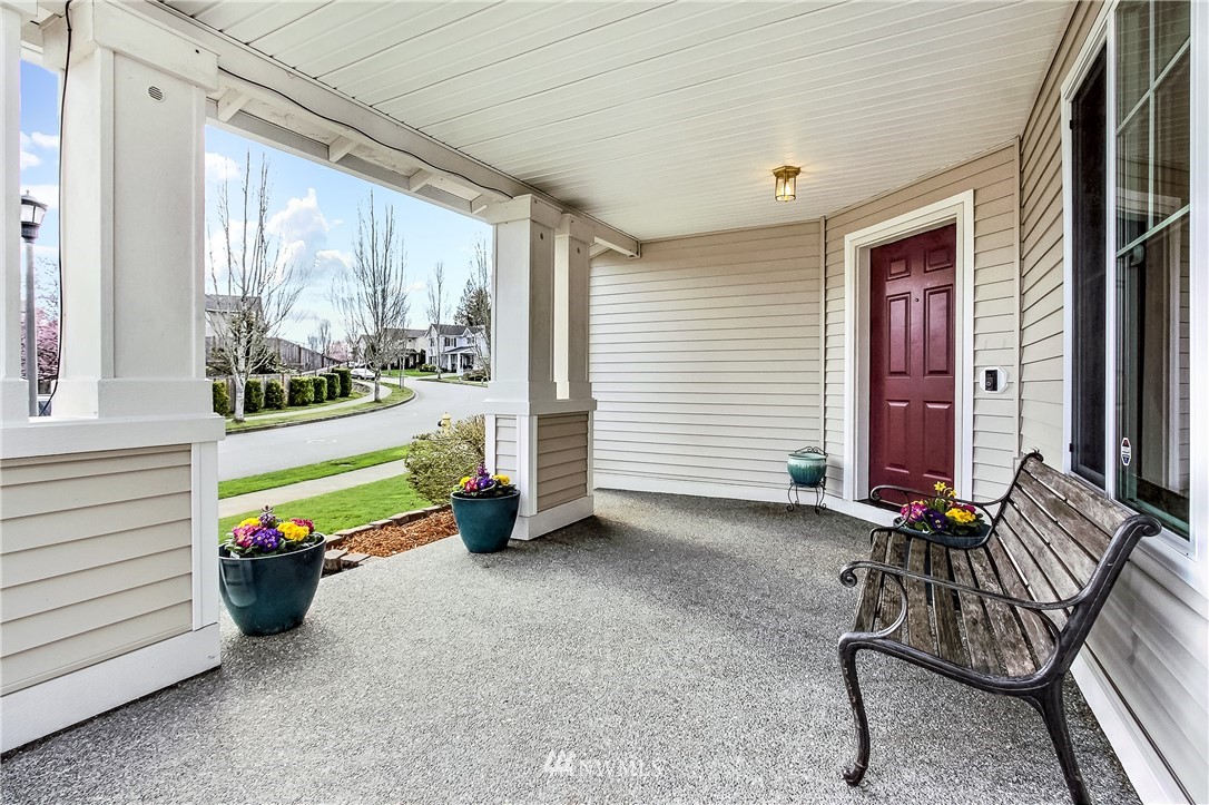 3141 Walker Road DuPont, WA 98327 - Photo 4 of 18 a view of front door with outdoor seating